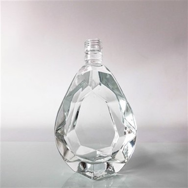 بطری شیشه ای 500 میلی لیتری 520 گرمی کهربایی شکل